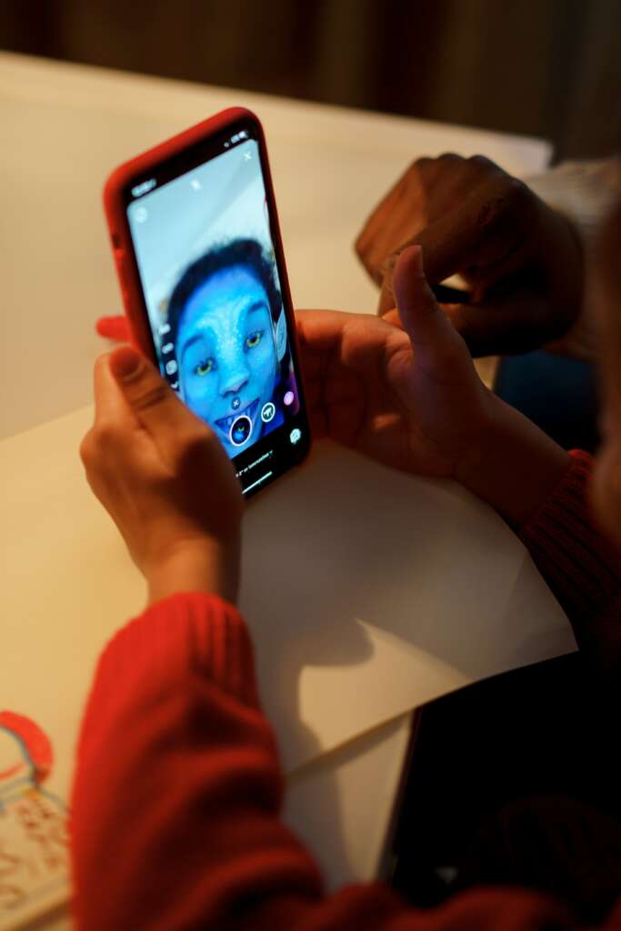 Person uses a filter on their phone