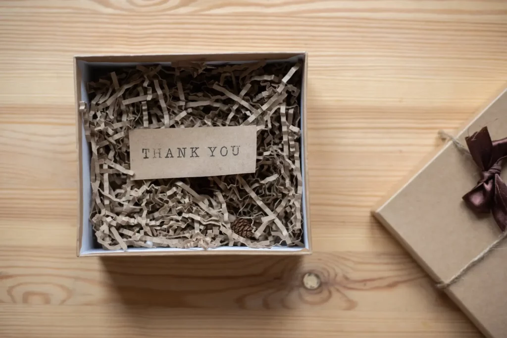 A thank you box from holiday gifts for employees