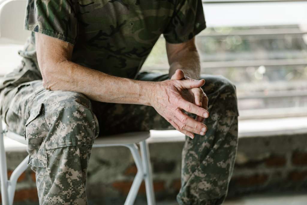 Veterans sitting in a chair