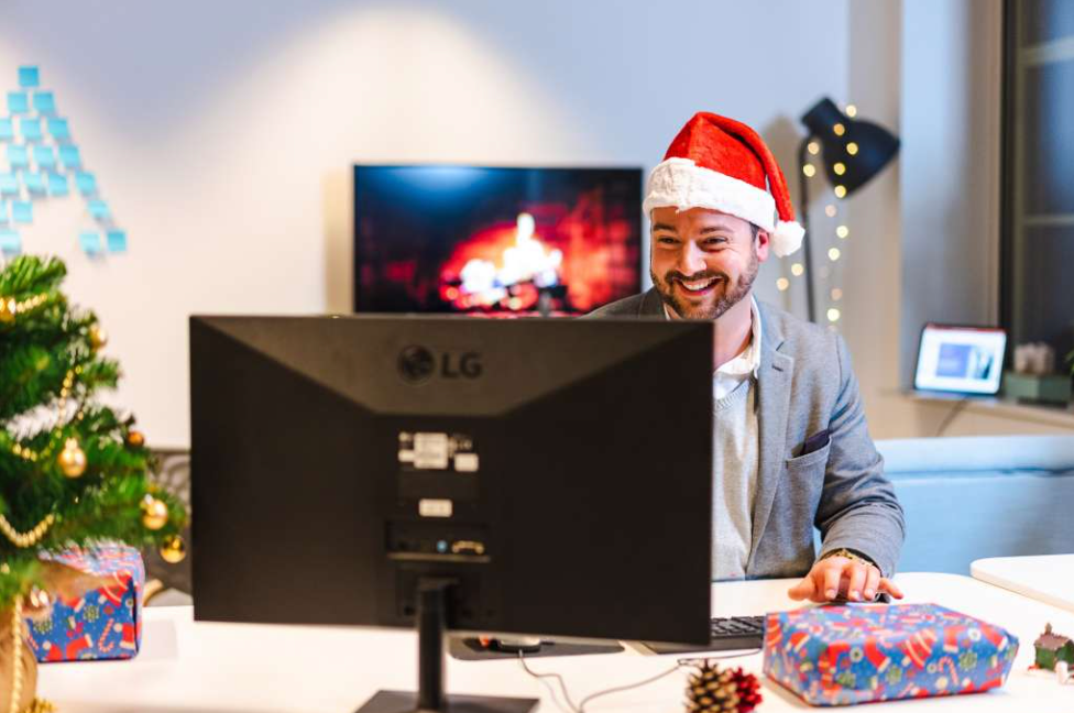 employee opening a gift