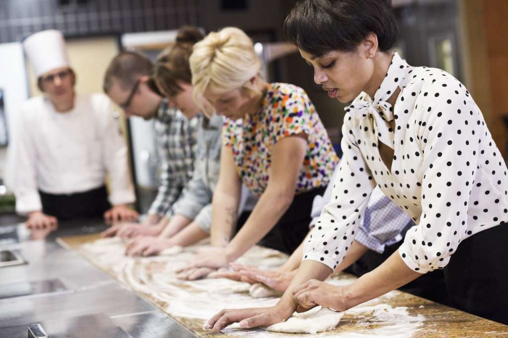 A chef teaching a cooking class