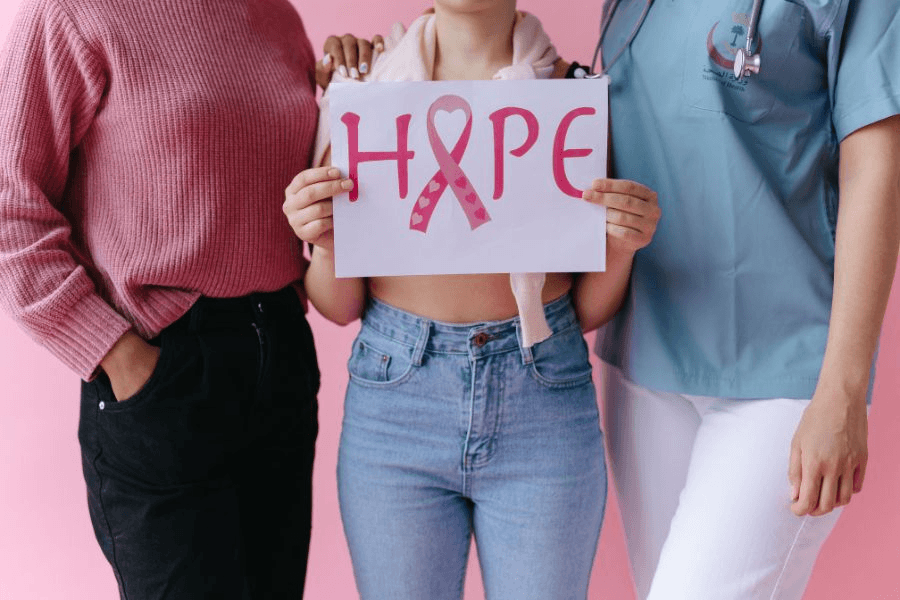 Patient holding up a hope sign