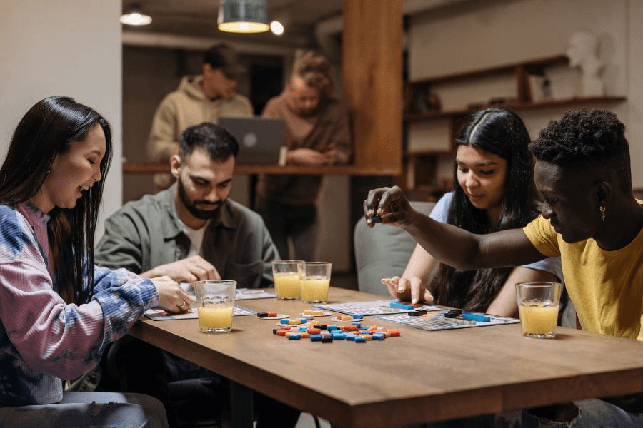 people playing a board game with is one of the 20 Best Gifts Under $100