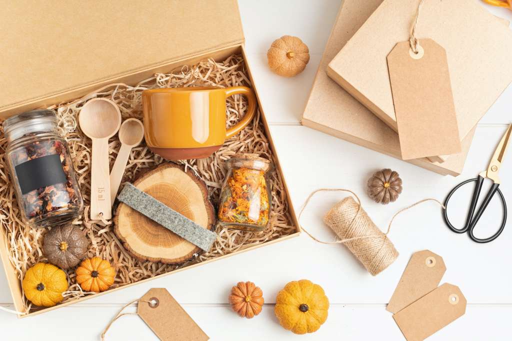 Preparing care package, seasonal gift box with plastic free, zero waste products
