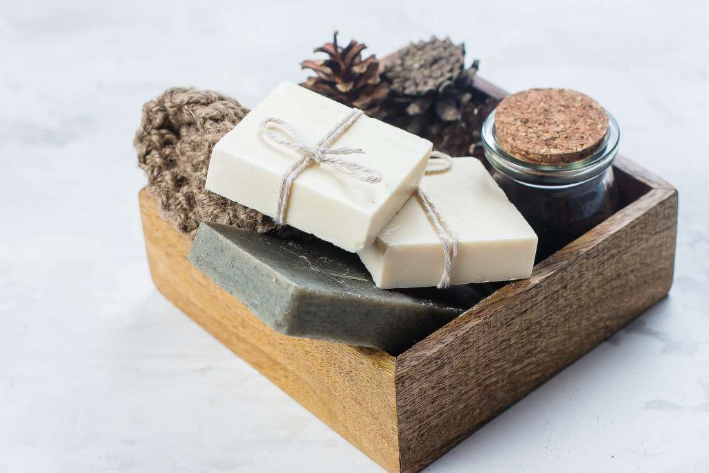 Handmade soap, coffee body scrub and body brush in wooden box