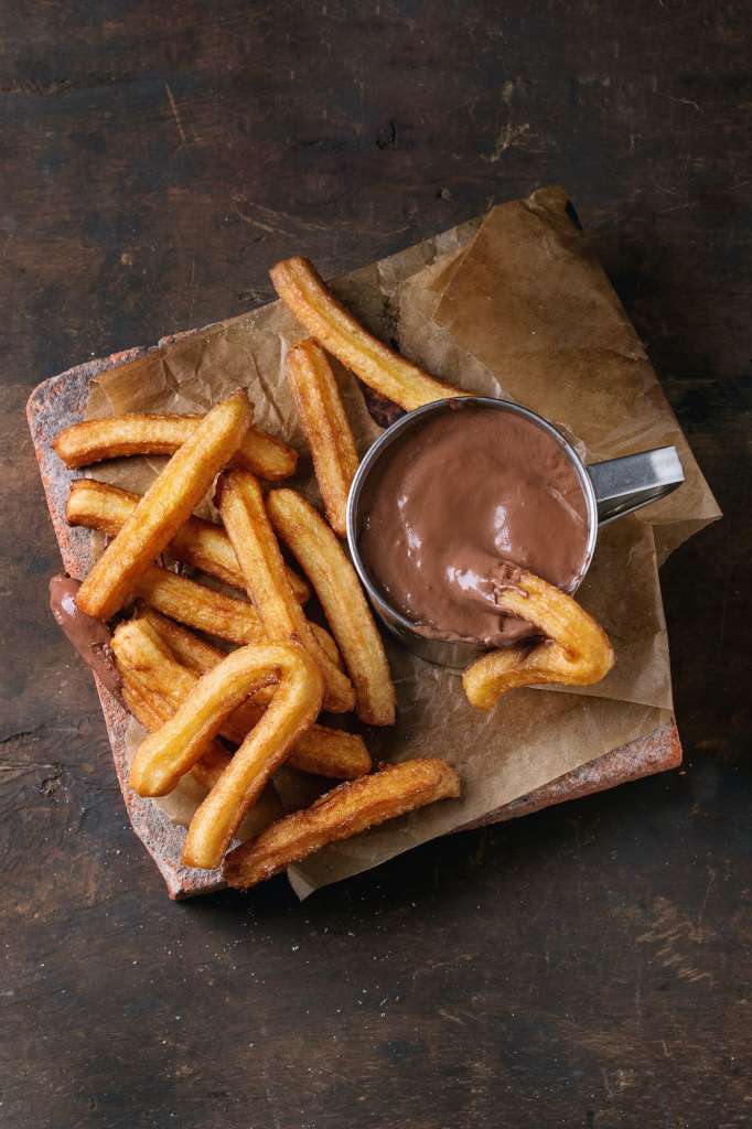 Traditional spanish churros with chocolate