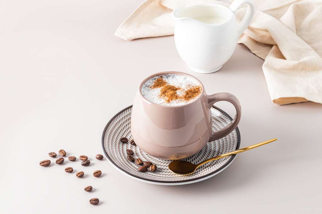 https://blogcdn.swagmagic.com/wp-content/uploads/2023/10/beautiful-ceramic-mug-with-hot-morning-cappuccino-coffee-on-white-table-with-coffee-beans--1024x683.jpg