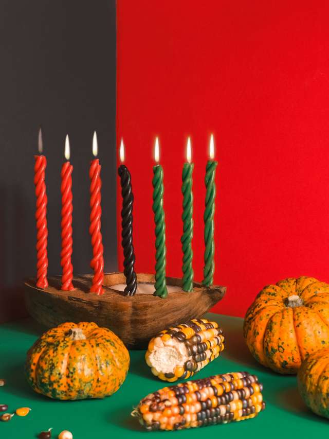 Kwanzaa, african holiday Kwanzaa with decoration of seven candles in red, black and green colors, ve