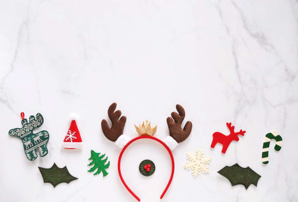 Fancy headband with reindeer antler and decorative christmas for party and celebration on white